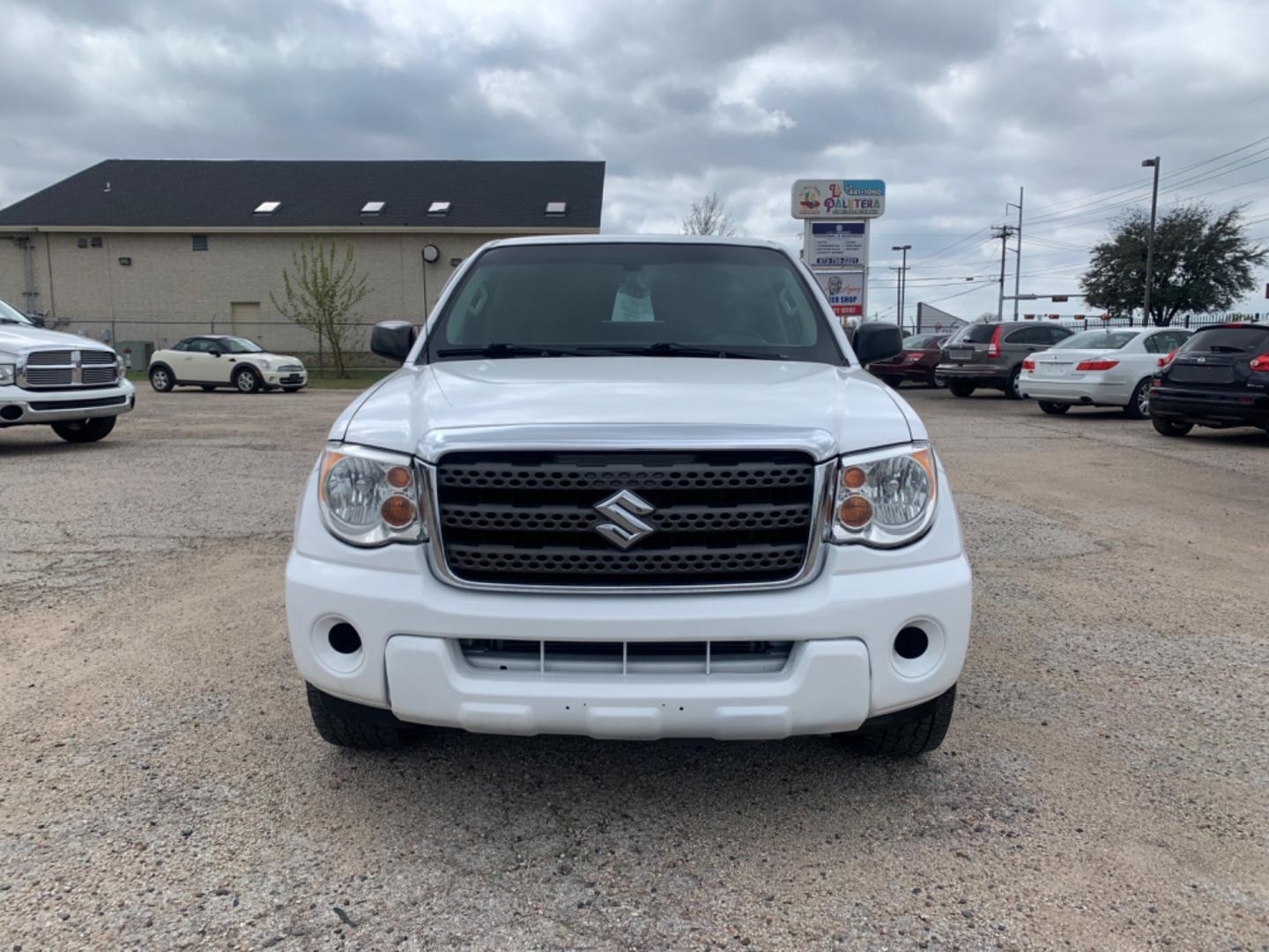 2012 White Suzuki Equator Sport Crew Cab 2WD (5Z61D0ER4CC) with an 4.0L V6 DOHC 24V engine, Automatic transmission, located at 1830 North Belt Line Road, Irving, TX, 75061, (469) 524-0199, 32.834373, -96.993584 - Photo#1